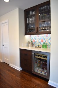 wet bar with colorful, patterned tile