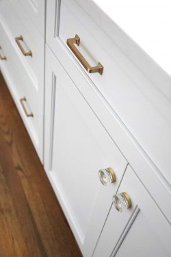 white cabinetry gold knobs