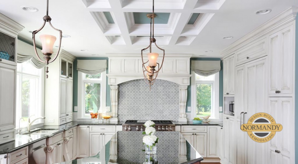 White painted kitchen cabinets with a coffered ceiling and robin's egg blue paint on the walls