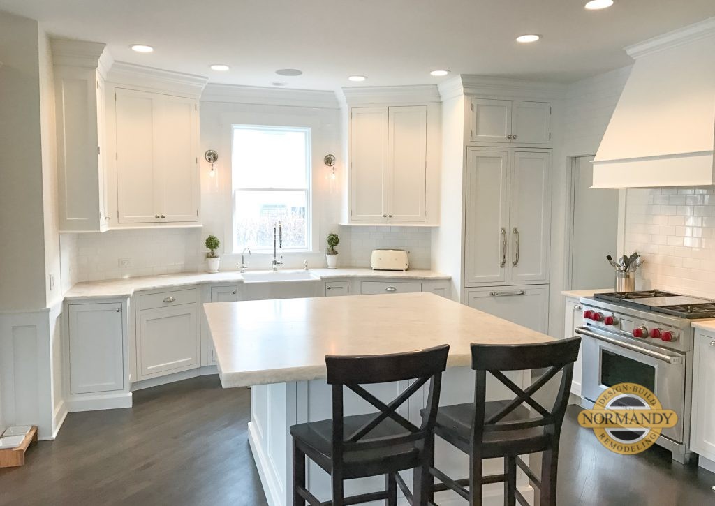 White kitchen with island and seating