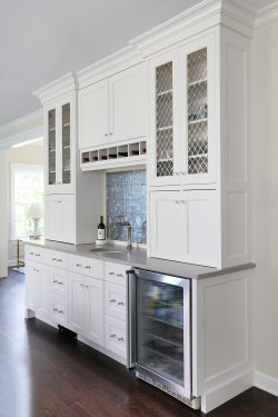 kitchen island with wine storage and contoured countertop