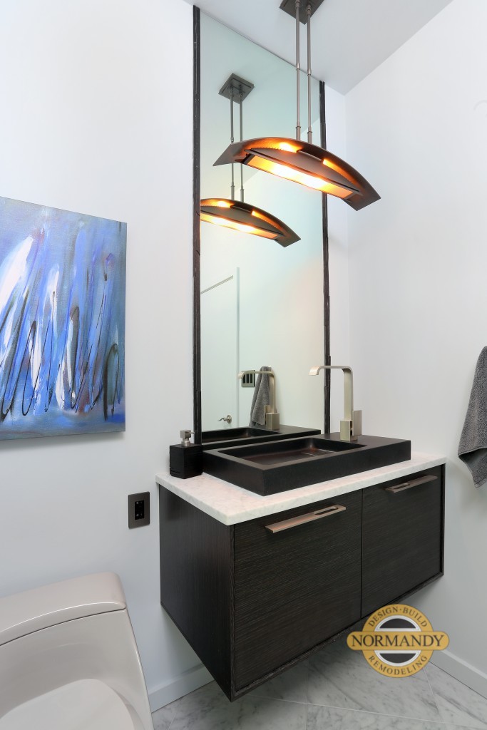 modern powder room with floating vanity