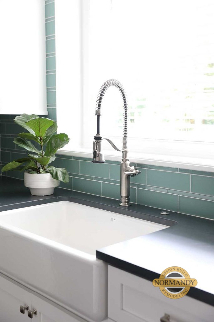 Professional looking faucet with a farmhouse sink