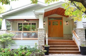 Craftsman style split level house with porch