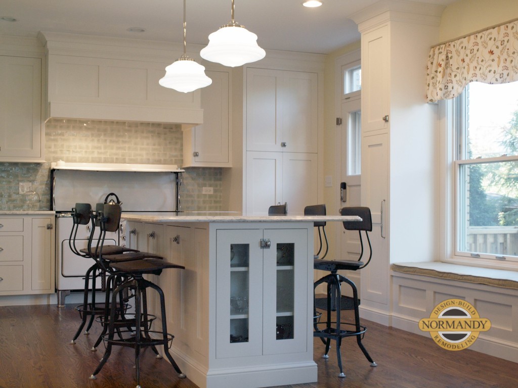 vintage inspired white kitchen with island seating