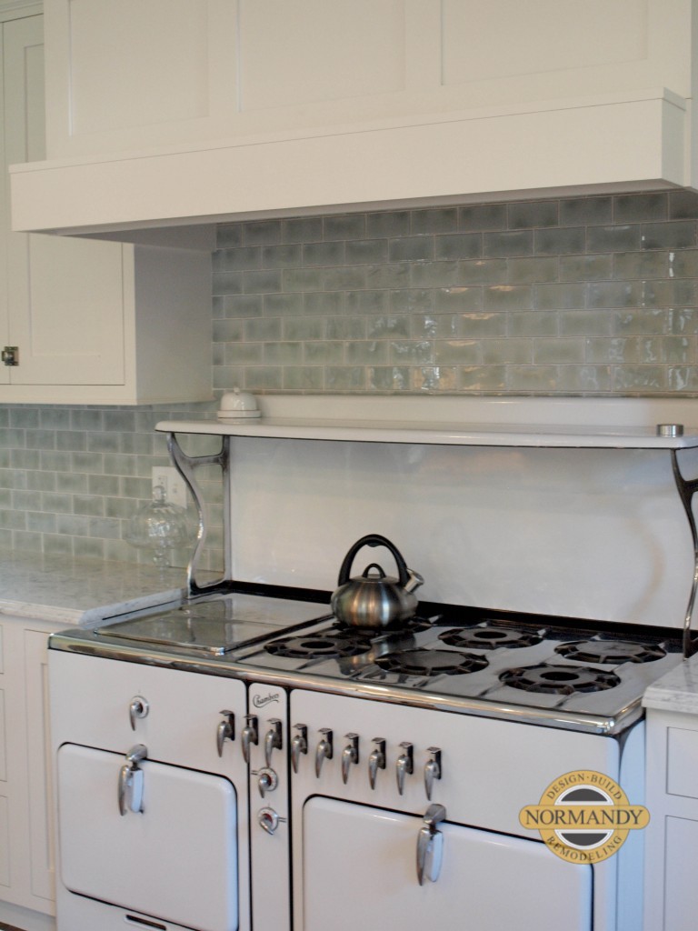 white kitchen with vintage stove