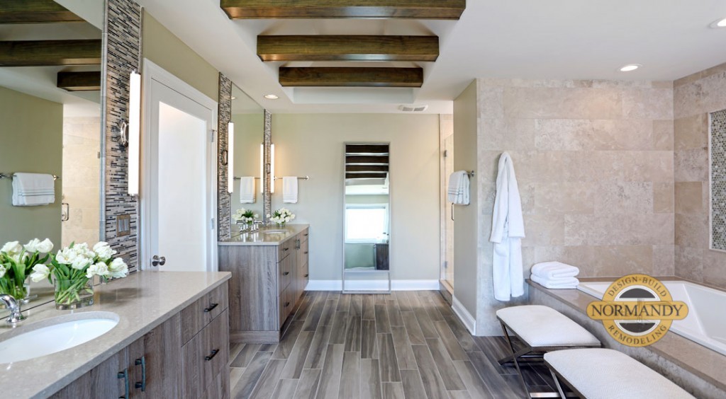 spa inspired master bathroom with two vanities and ceiling beams