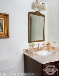 gold powder room ideas created by Normandy Designer Vince Weber