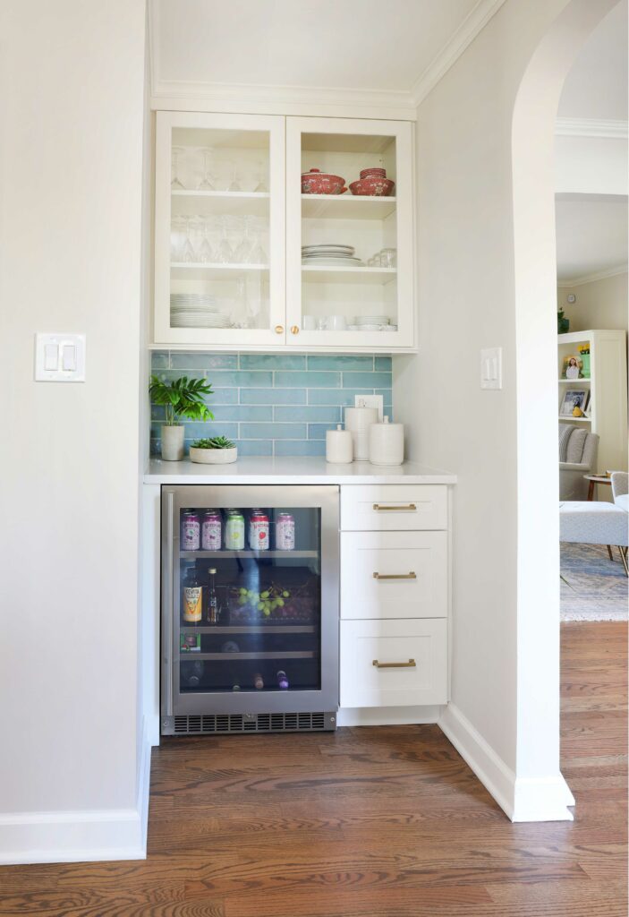 White cabinets and blue backsplash tile for a beverage center