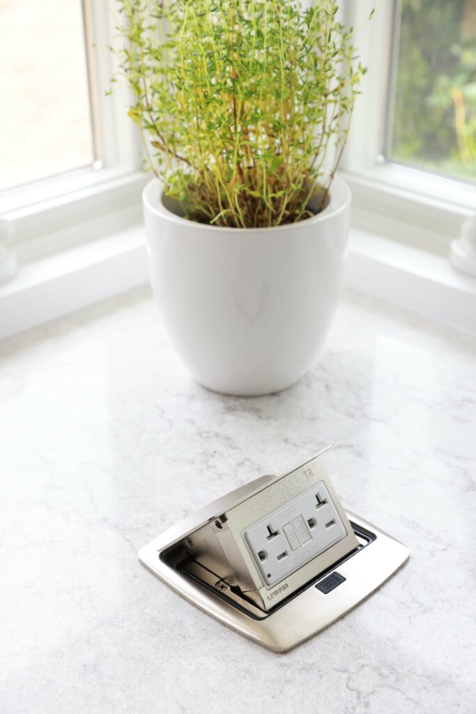 pop up countertop outlet in the kitchen