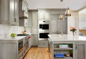 transitional kitchen in gray green with island