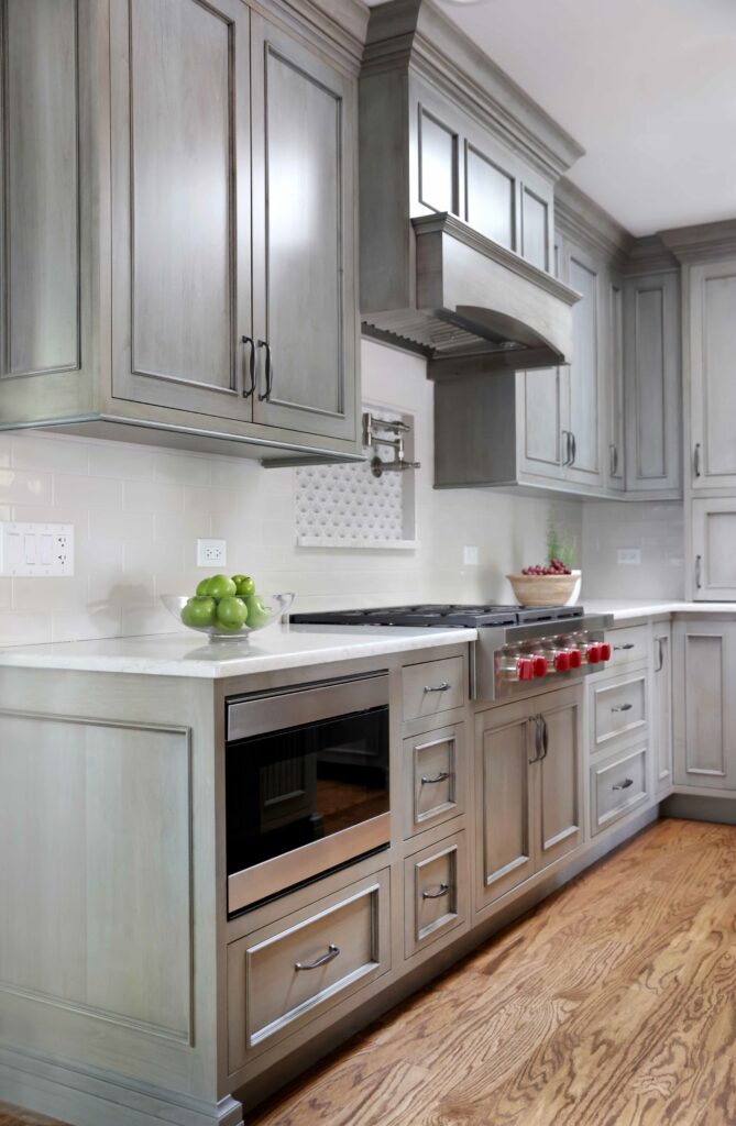 transitional kitchen gray green cabinets and convection oven