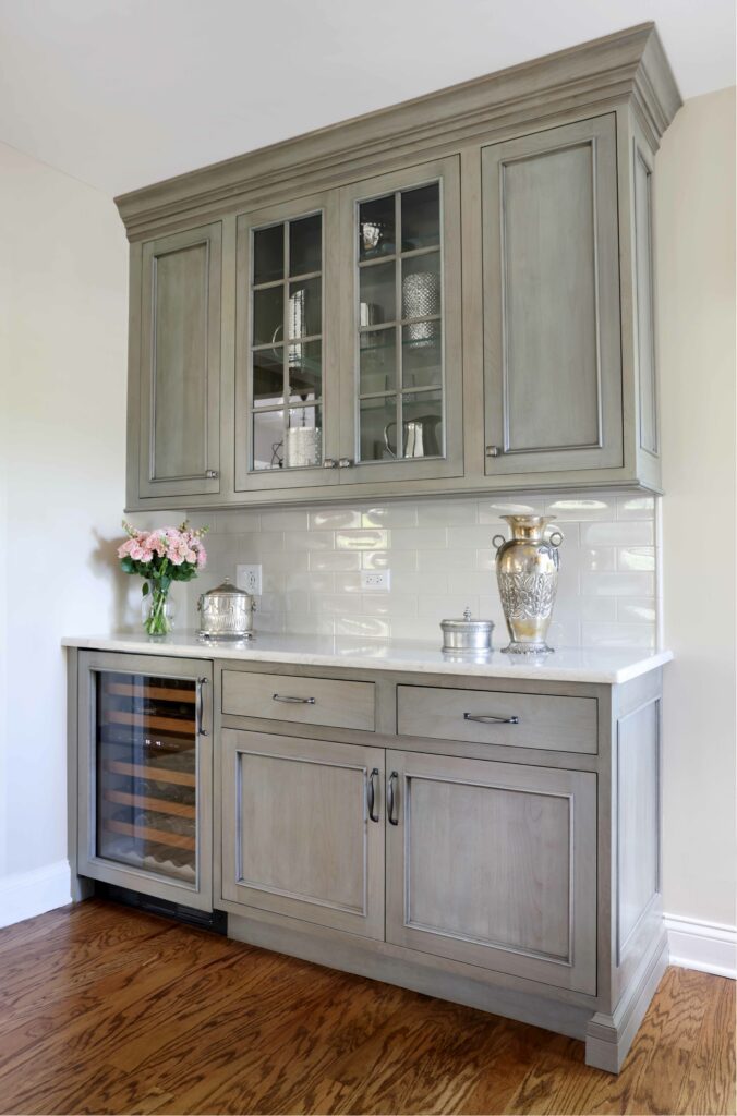 kitchen beverage center in gray with white subway tile