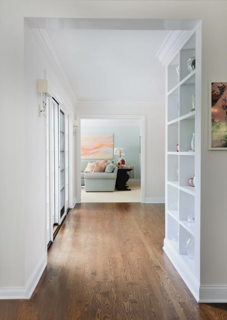 addition hallway with built in bookcase