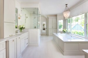 master bathroom with separate bathtub and shower