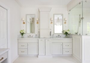 light gray cabinetry in large primary bathroom