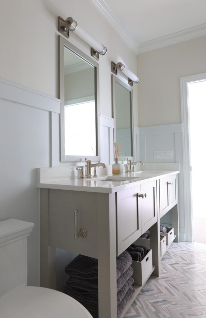 Wall treatments such as paneling or wainscoting are some of the top bathroom trends for 2023