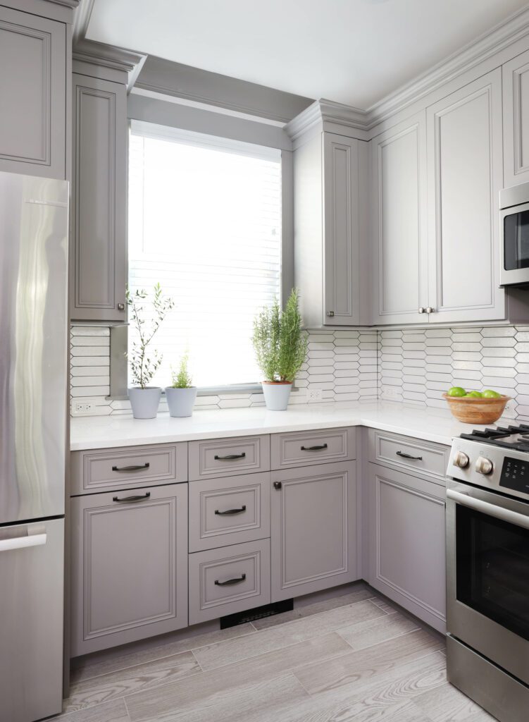 gray kitchen with ceramic geometric backsplash