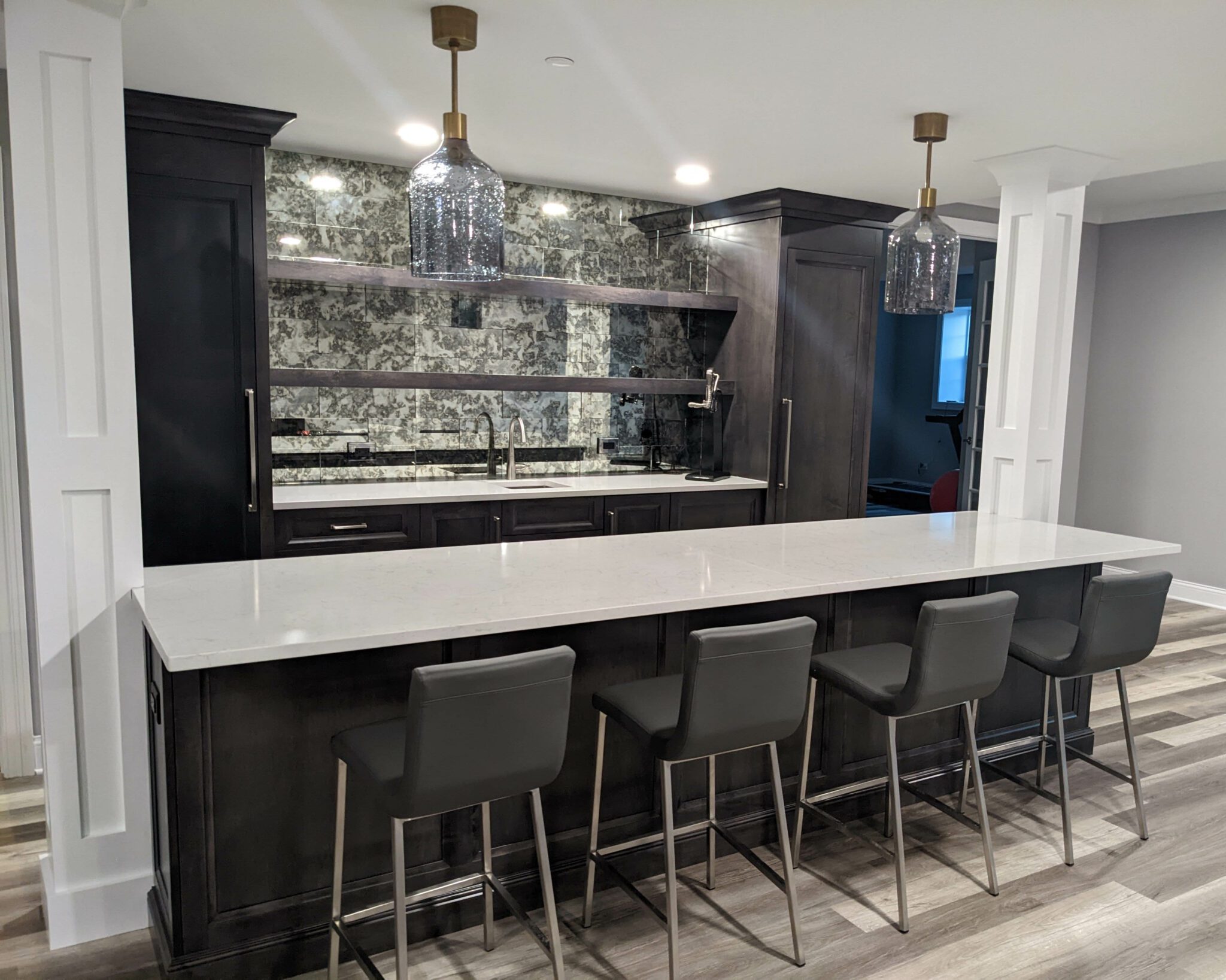 Finished Basement with Dramatic Bar Normandy Remodeling