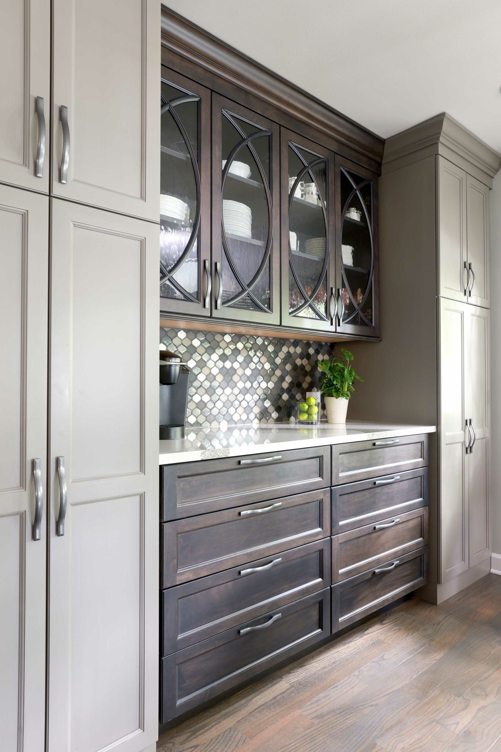 Built in buffet with gray painted and dark stained cabinetry