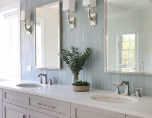 Double vanity with oval sinks, picket tile backsplash