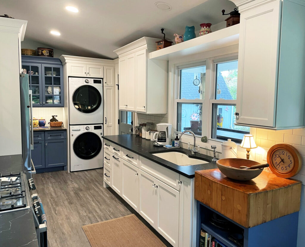 white farmhouse kitchen with stackable washer dryer