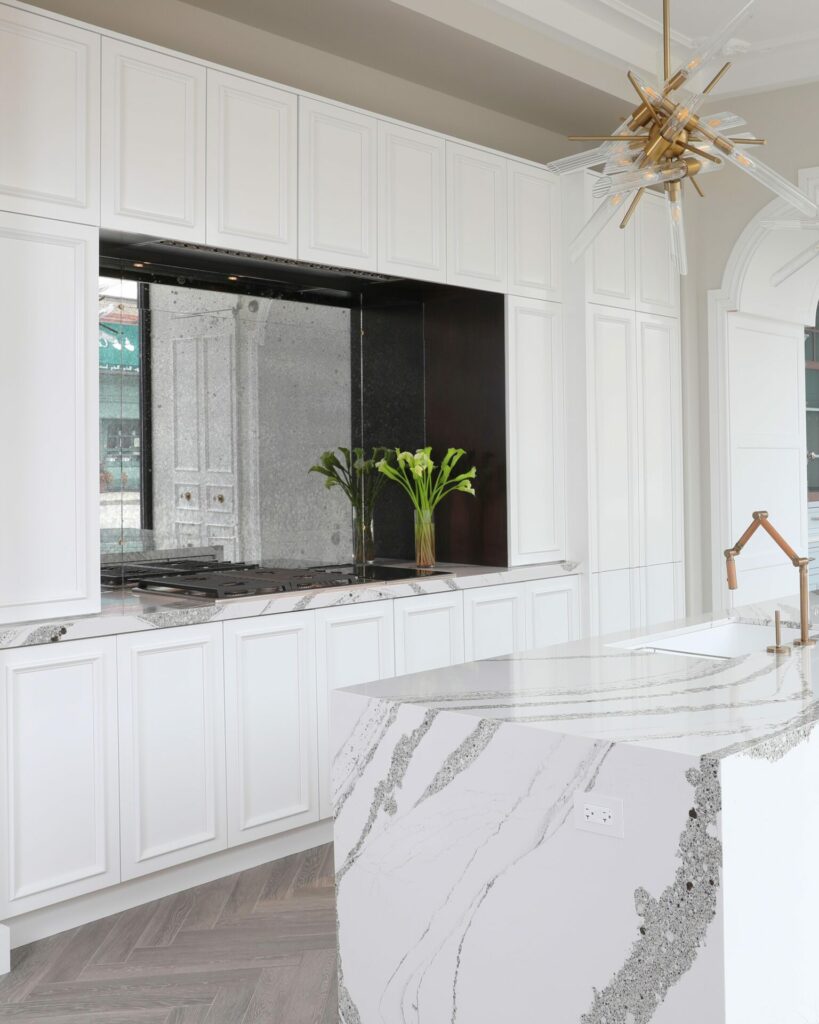 White kitchen with wood hood