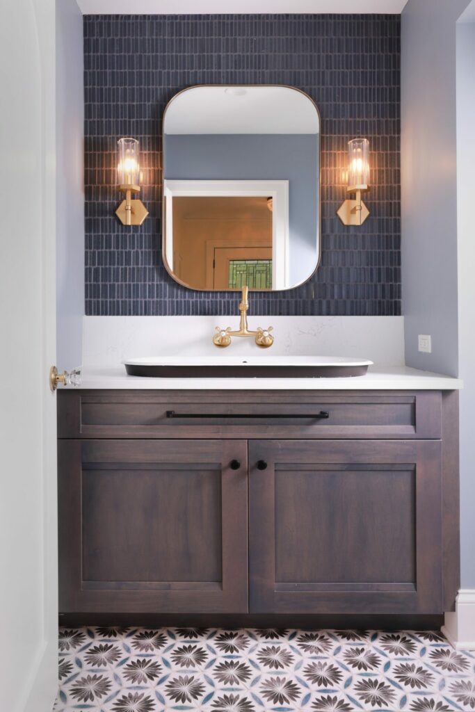 powder room with blue backsplash tile