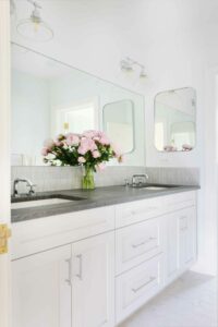 hall bathroom with double vanity