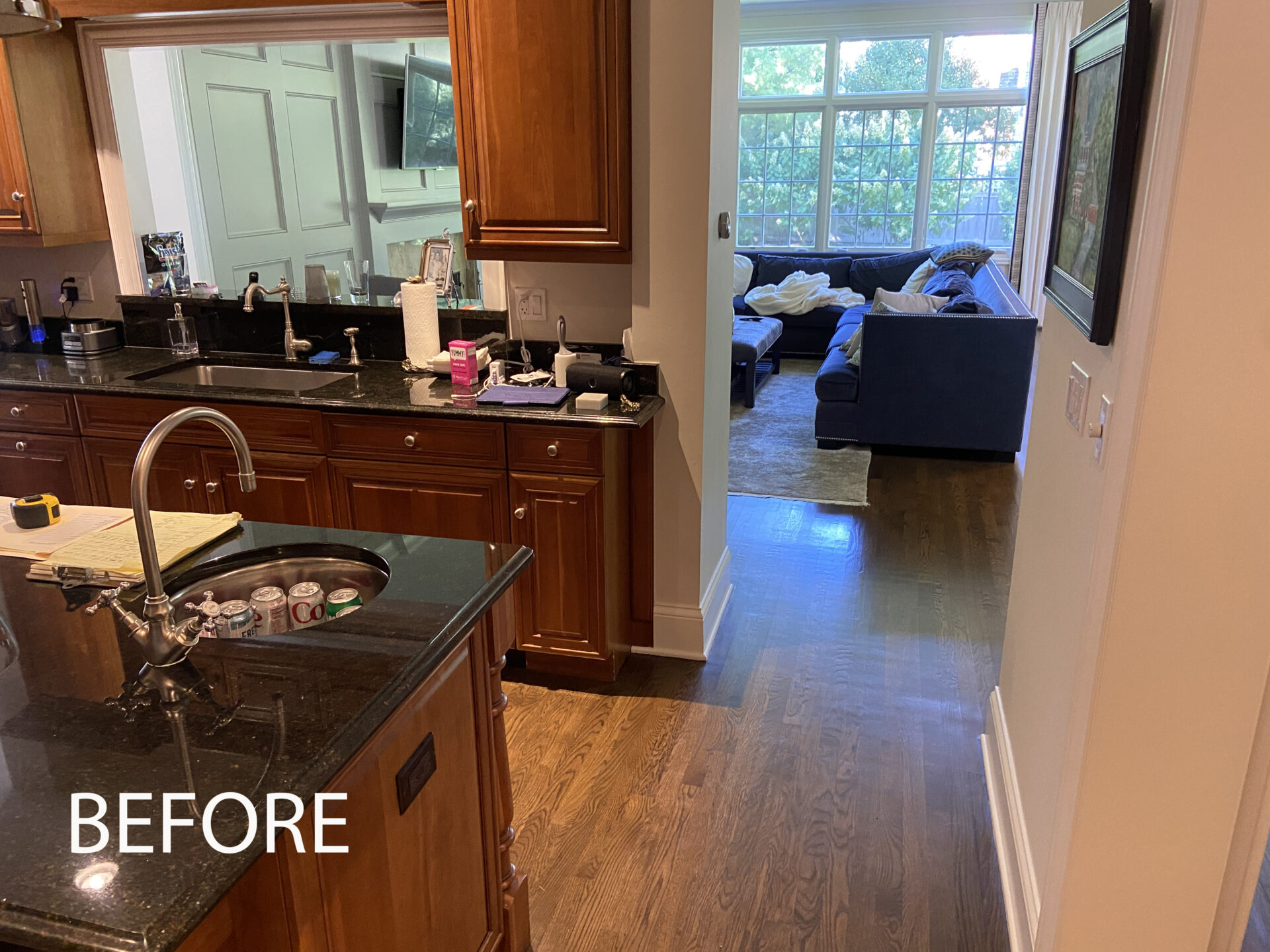Before kitchen photo featuring wall that was removed during the remodel