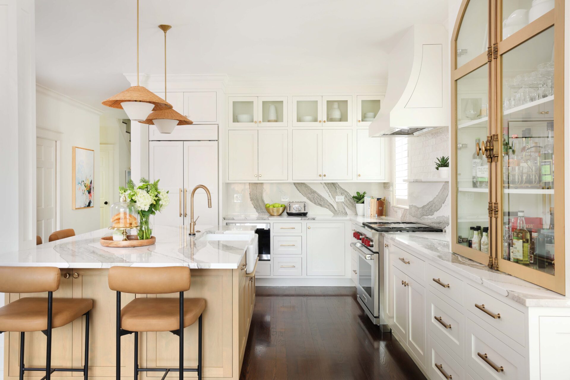 Welcoming white kitchen with distinctive countertops and vintage inspired accents. The hutch doors are secured with cabinet latches.