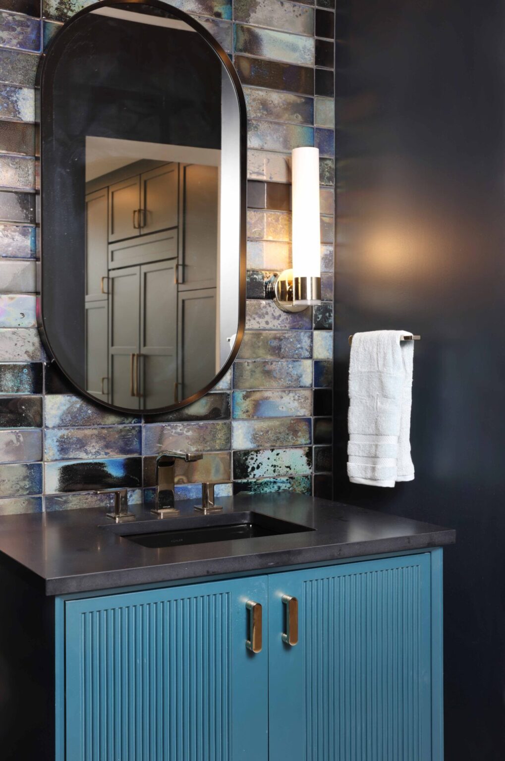The Dark and Moody Powder Room - Normandy Remodeling