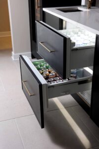 Double dual refrigerator drawers, stained rift cut white oak cabinets