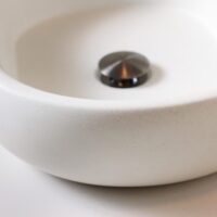 White textured vessel sink