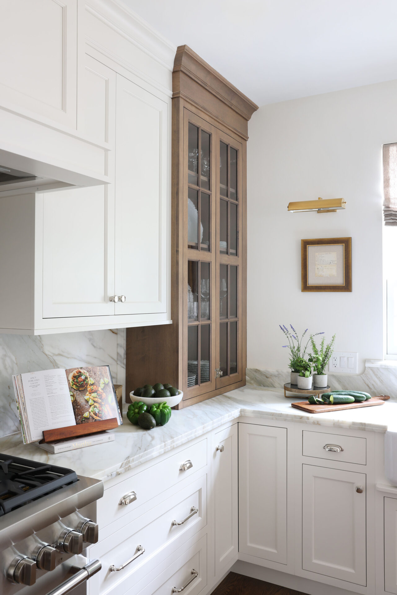 Classic Elmhurst Kitchen includes a set of stained maple cabinets that extend all the way down to the countertop. The counter cabinet doors secure with latches.