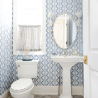Classic Elmhurst Kitchen and First Floor Renovation includes a delightful powder room with pedestal sink and matching toilet.