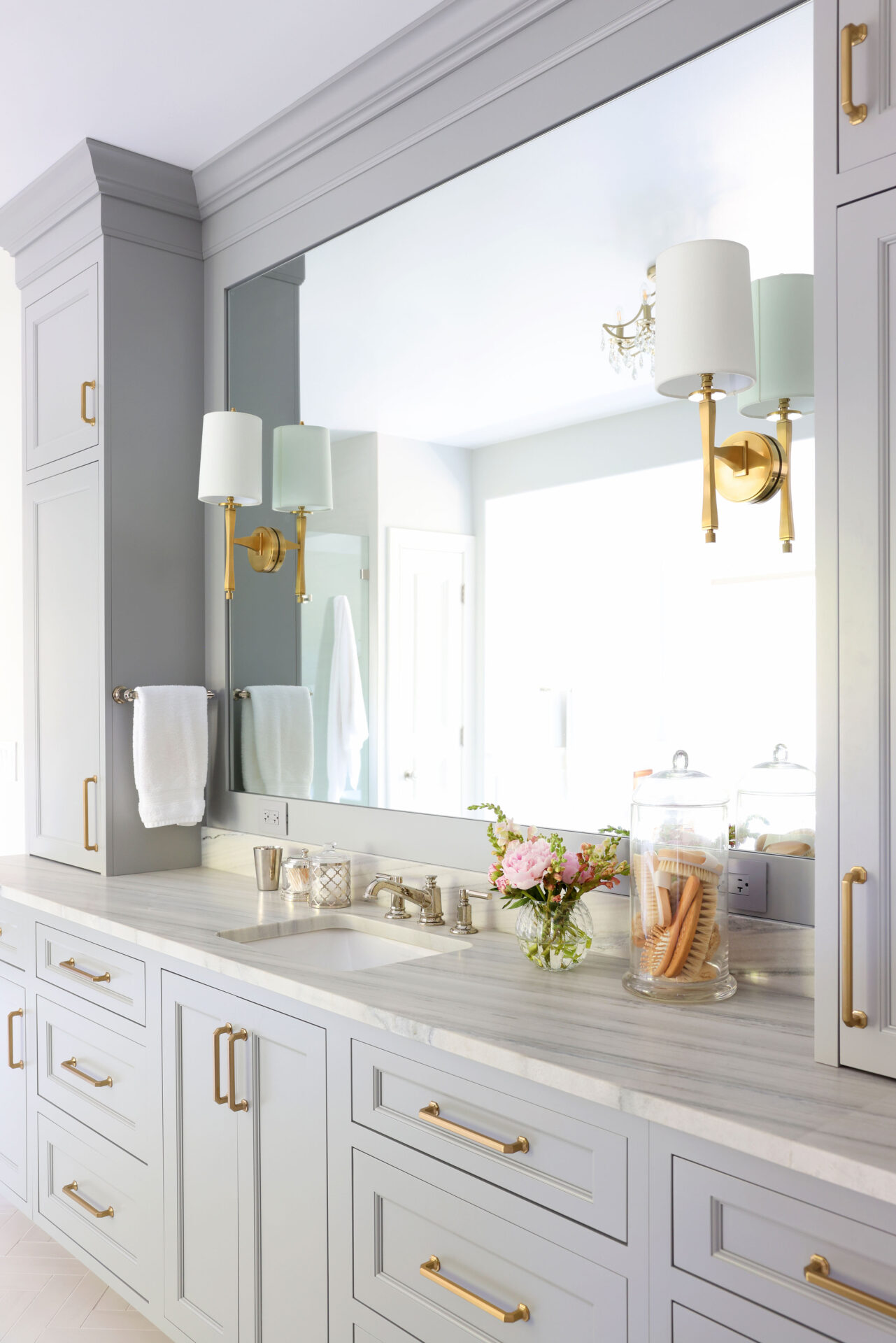gold sconces, rectangular sink, leathered countertop