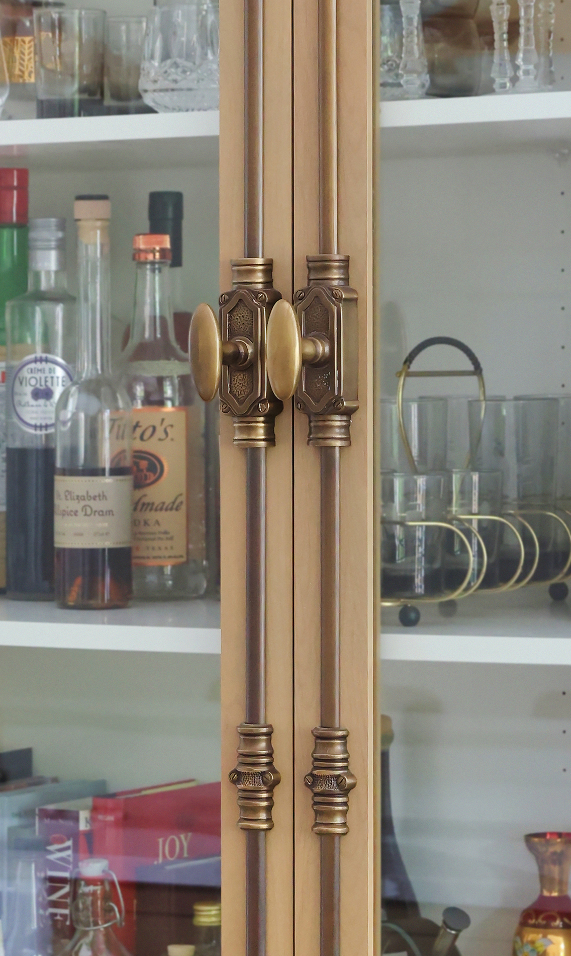 Cabinet latches secure the doors on this vintage-inspired hutch.